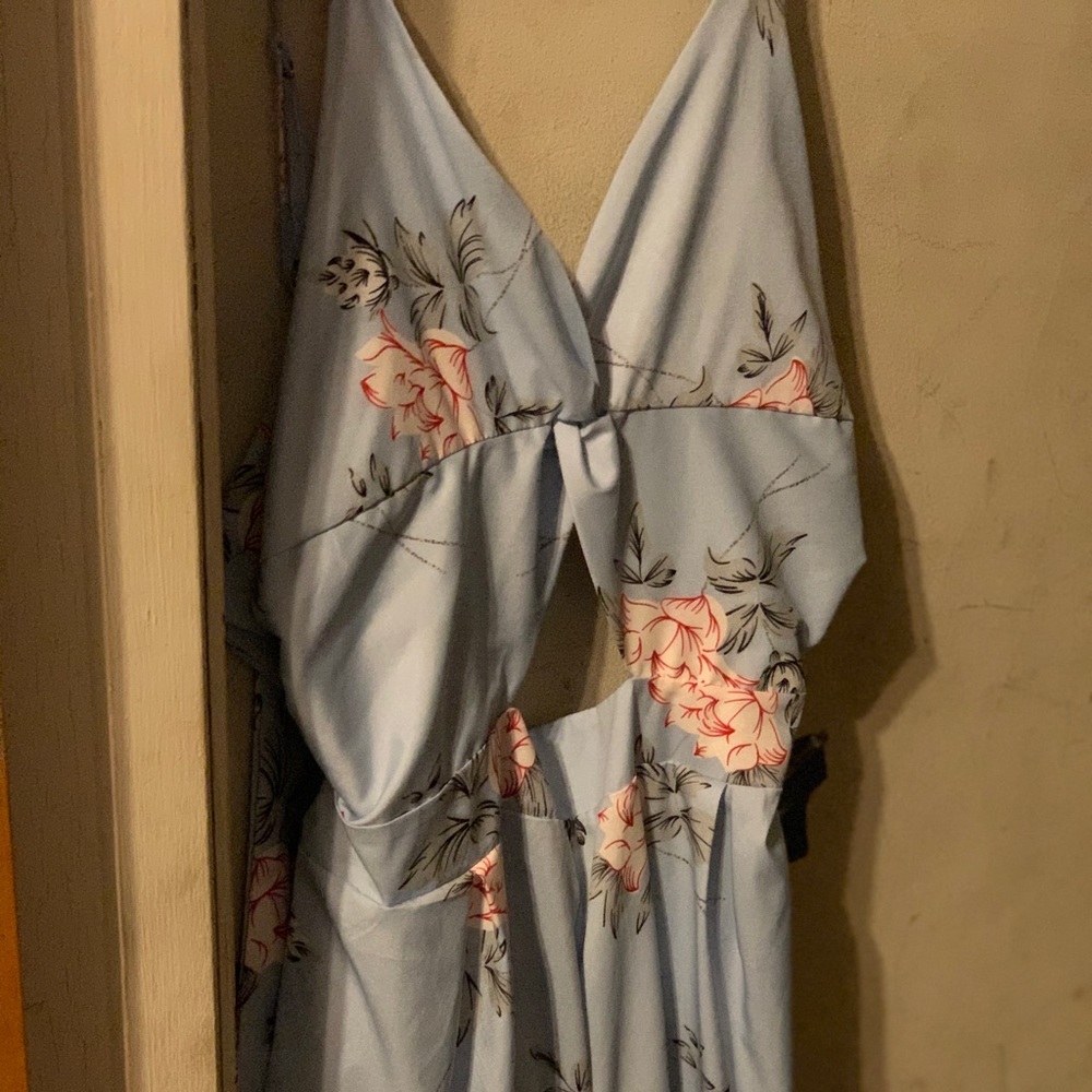 Blue romper with pink flowers